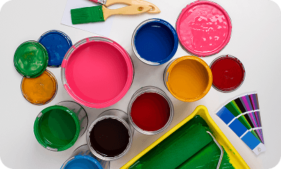 Colorful paint cans and palette